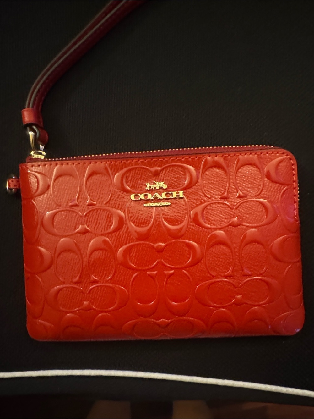COACH Red Embossed Signature Wristlet with Gold Logo
